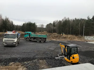 ROMI - Usługi koparko - ładowarką/ Usługi transportowe